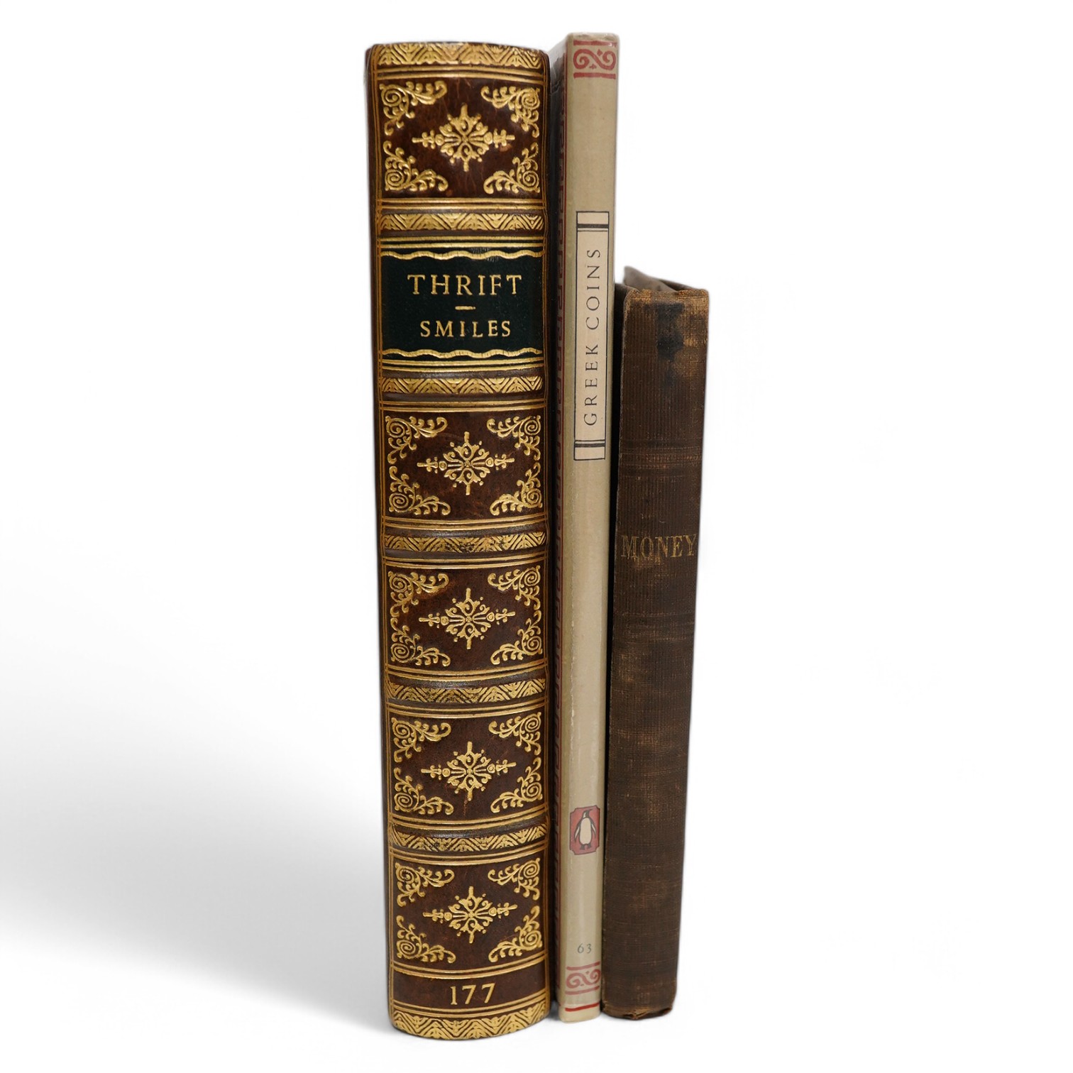 Money; it's nature, history, uses, and responsibilities. R.T.S. (Monthly Volume No.84), brown cloth, 1852; Smiles, S. - Thrift, 1888, full calf, ex ESCL; King Penguin - Greek Coins, 1952. (3)